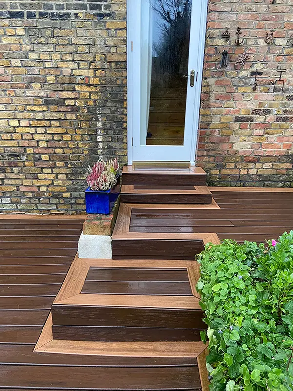 Composite decking installation in a London garden