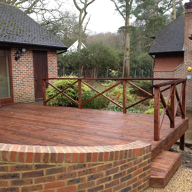 Raised timber decking structure in a London garden